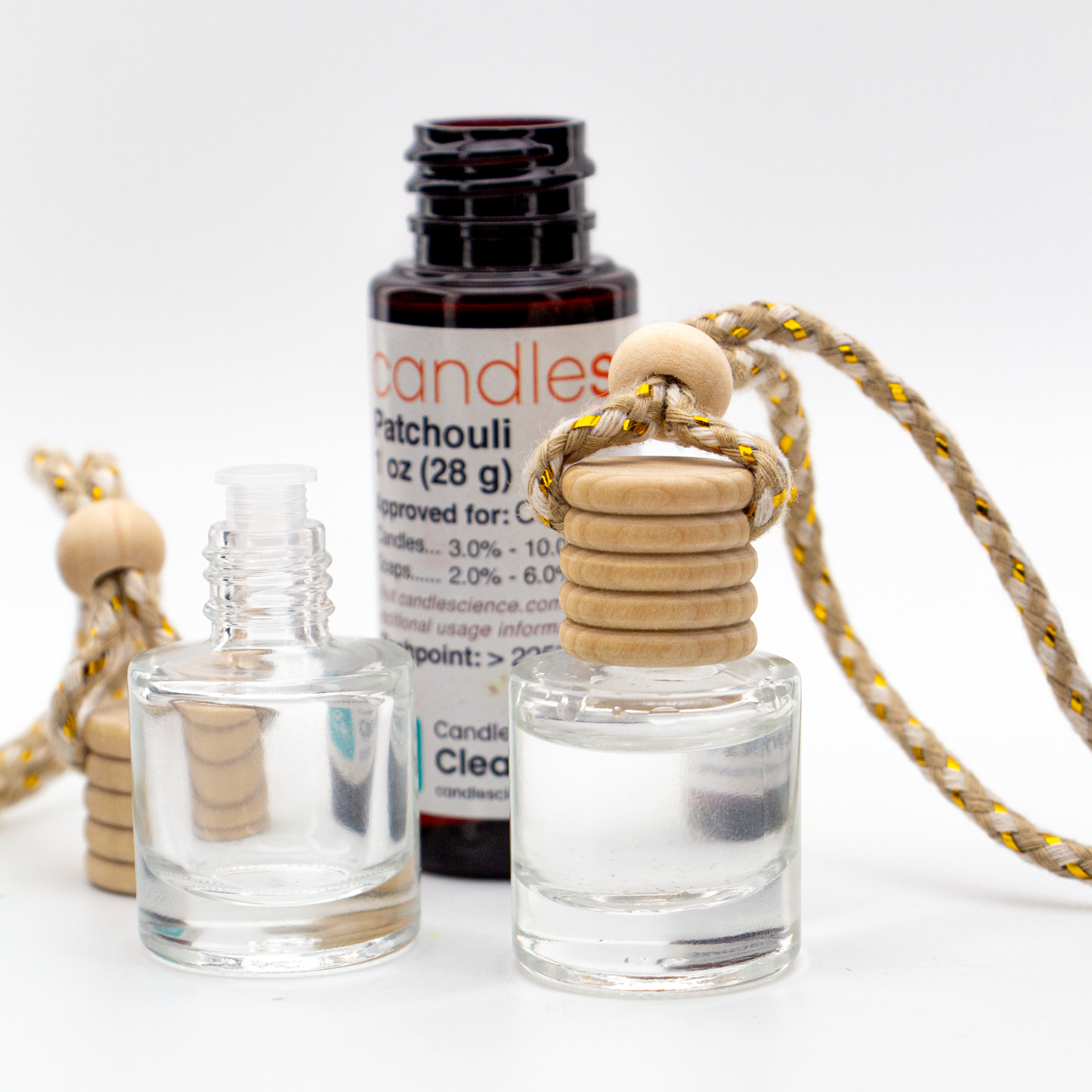 Difusor Aromático / Aromatizante para Auto / Carro – Frasco Colgante Recargable de Vidrio y Madera Cilindrico - Transparente 5ml